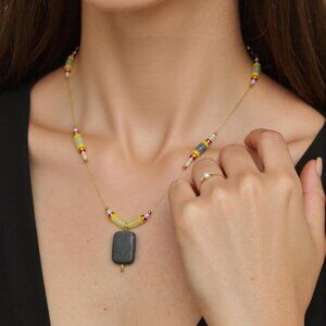 Atlantic waves and night Skies. Medium length floating choker. Grey/yellow/soft